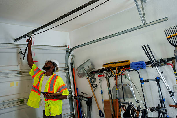 Professional Garage Door Spring Repair technician working in Luna Pier, MI